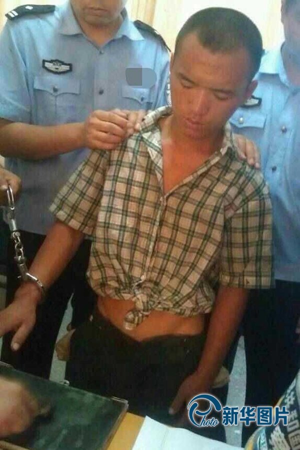 2013年8月20日午間，河南省安陽警方將“8.19公交搶劫案”嫌犯24歲的周江波緝拿歸案。圖片來